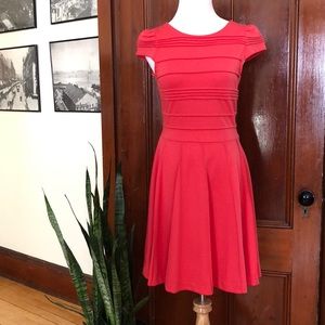 Elle “Parisian Polished” red dress